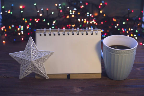 Christmas still life with coffee, toy and a notebook — Stock Photo, Image