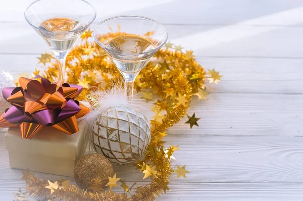 Still life with two glasses and a gift box — Stock Photo, Image