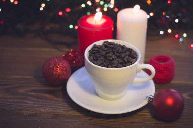 Natürmort bir fincan kahve ve mum