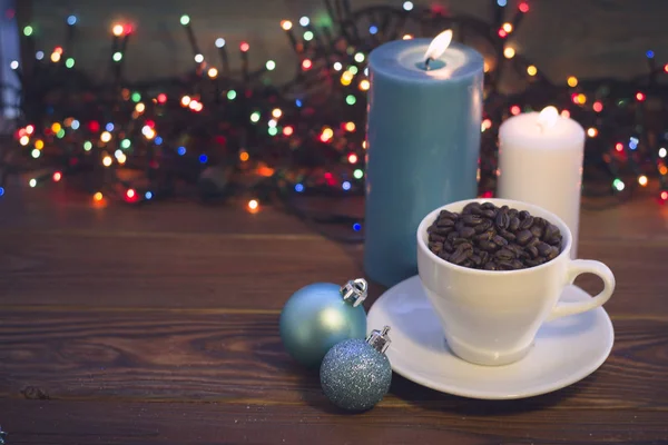 Natura morta con una tazza di caffè e candele — Foto Stock