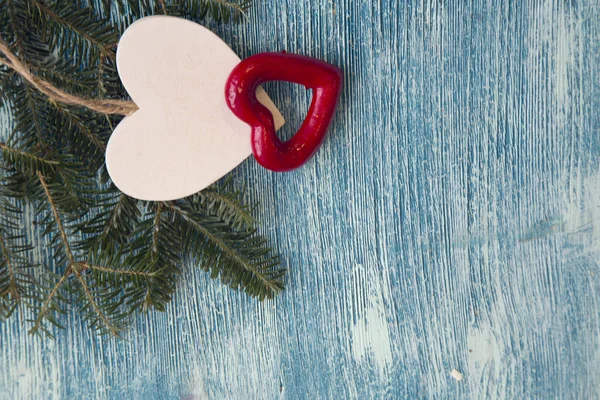 Süslemeleri ile mavi bir ahşap Noel arka plan