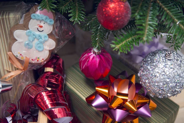 Gifts under a decorated Christmas-tree — Stock Photo, Image