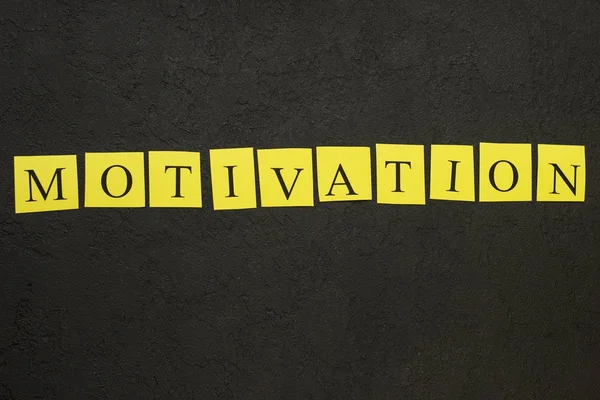 Motivation horizontal inscription on a black background — Stock Photo, Image