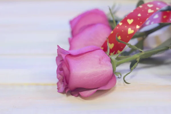 The concept of holidays with pink roses — Stock Photo, Image