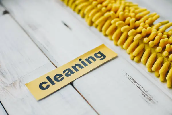 Yellow mop head on white background — Stock Photo, Image