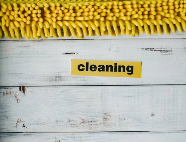 Yellow mop head on white background — Stock Photo, Image