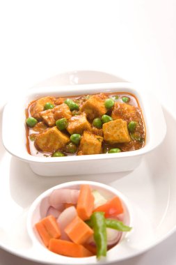 peynir pişmiş kremalı sos içinde Hint yemeği