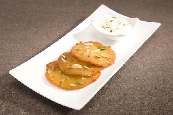 Hint tatlı Rabri ve Malpua