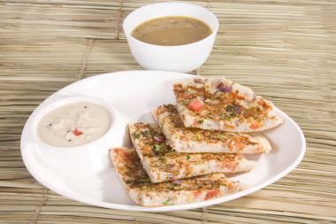 Güneyde Hint yemeği soğan Uthappams