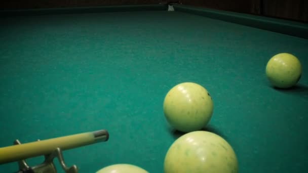 The tip of the cue strikes a billiard ball. Slow mo. — Stock Video