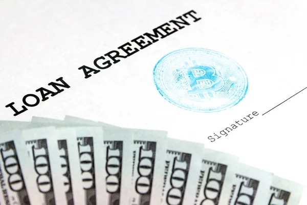 A loan agreement with a blue bitcoin stamp and a place for signing. One thousand dollars. Exchange rate of crypto currency.