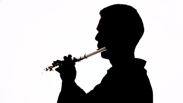 Isolated Silhouette Guy Playing Flute Black White Footage — Stock Video