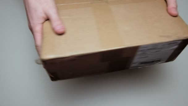 Man Lays Packaging White Table Unpacking Parcel Male Hand Close — Stock Video