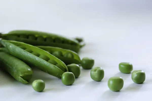 Fresh Green Peas Macro - organic food from the garden.