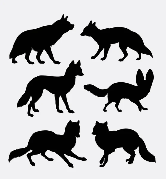 狐と狼のシルエット — ストックベクタ
