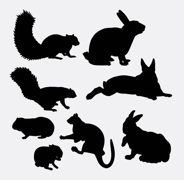 Conejo y ardilla mamífero silueta animal — Archivo Imágenes Vectoriales