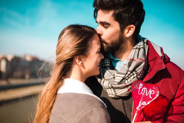 Handsome Man Kissing His Beautiful Girlfriend Forehead — Stock Photo, Image