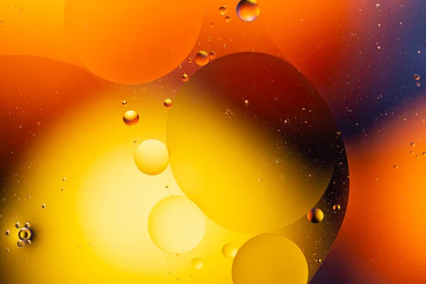 Close-up water and oil abstract in a rainbow lighting effect — Stock Photo, Image