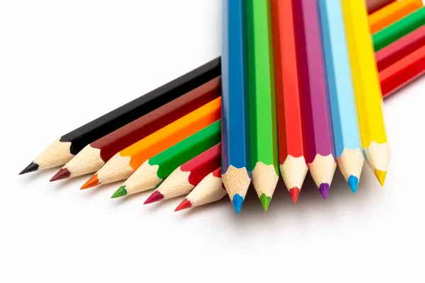 Барвисті дерев'яні олівці на білому тлі — стокове фото
