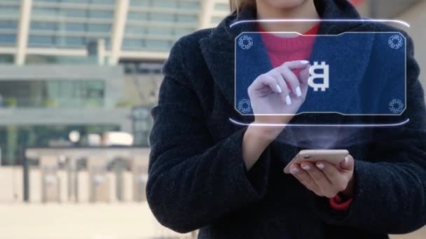 Woman interacts HUD Sign BTC — Stock Video