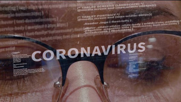 Coronavirus text on background of software developer — Stock Photo, Image