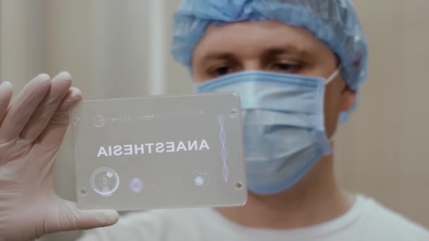 Arts gebruikt tablet met tekst Anesthesie — Stockvideo