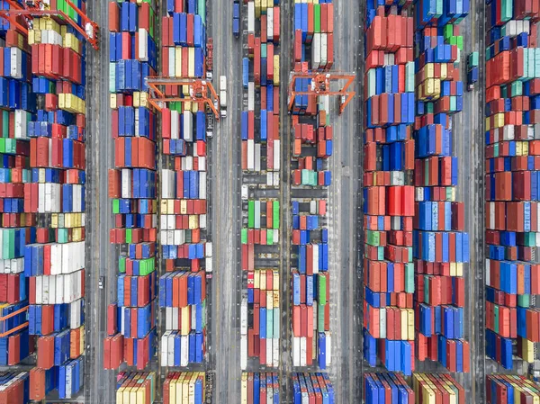 Aerial top view container in port warehouse waiting for export . — Stock Photo, Image