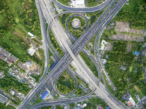 aerial top view roundabout road with intersection not wait for t