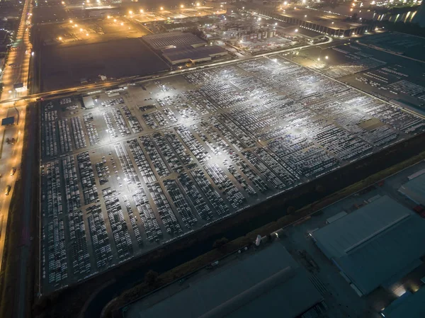 Aerial top view factory car production to export at night. — Stock Photo, Image