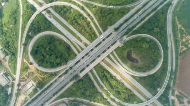 Time lapse aerial view above of circus road traffic cars in bangkok thailand.