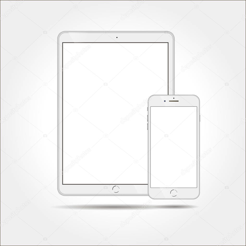 White business tablet and smartphone similar to iPad and iPhone  on white background.