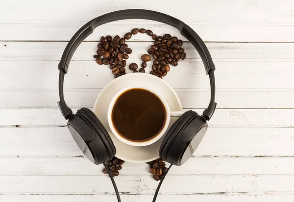 Morning coffee and music concept with headphones — Stock Photo, Image