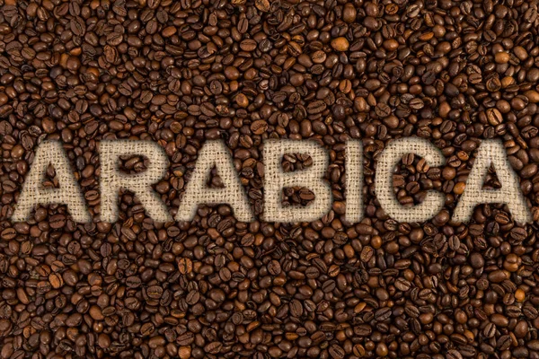 Arabic concept written on coffee beans