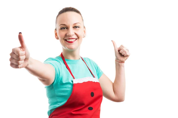 Happy cheerful maid housewife or housekeeper showing houble like — Stock Photo, Image