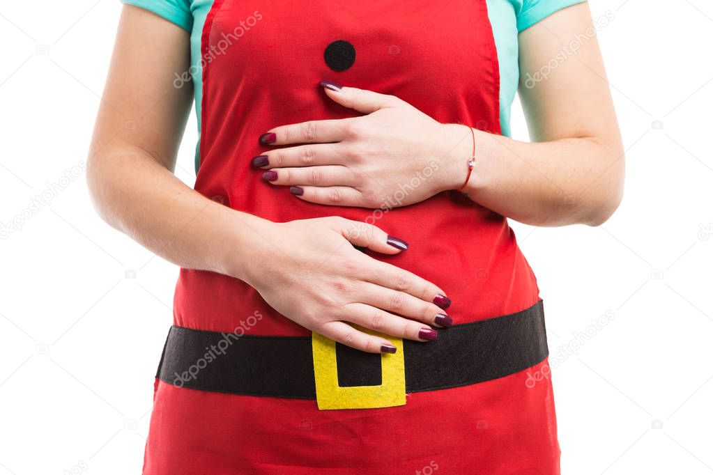 Christmas overeating or indigestion abdominal pain concept