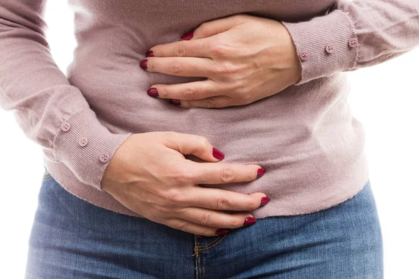 Woman holding her tummy as painful abdomen problem — Stock Photo, Image