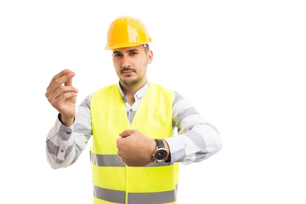 Engenheiro ou arquiteto mostrando relógio e gestos de dinheiro — Fotografia de Stock