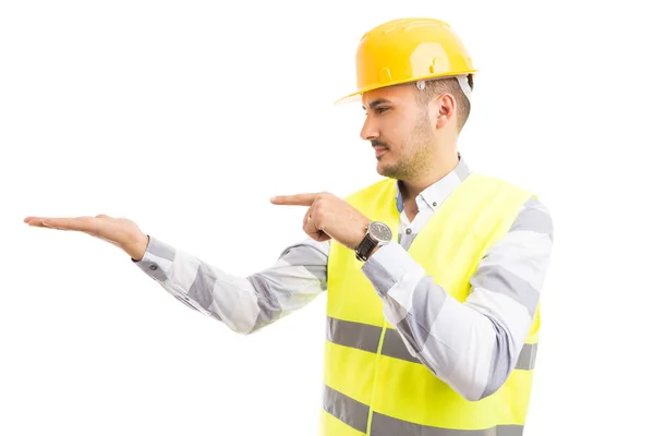 Engineer or architect holding presenting empty copy spac — Stock Photo, Image
