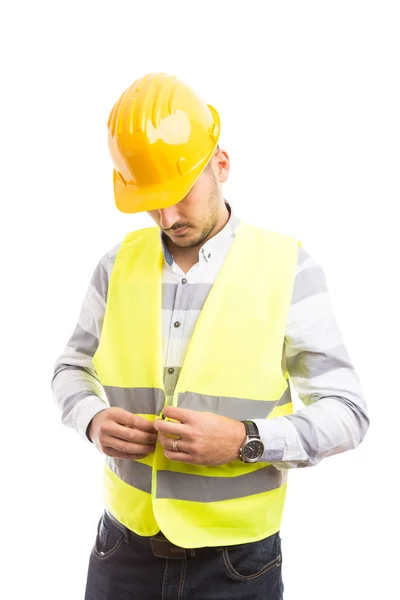 Construction worker or builder dressing for jo — Stock Photo, Image