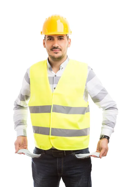 Construtor ou construtor mostrando bolso calças vazias — Fotografia de Stock