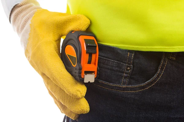 Construction worker builder or carpenter holding waist meter rol — Stock Photo, Image