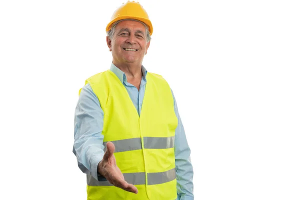 Construtor homem oferecendo aperto de mão — Fotografia de Stock