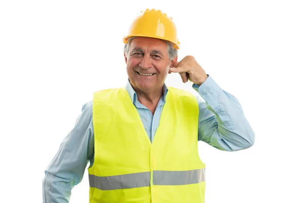 Construtor fazendo gesto de chamada — Fotografia de Stock