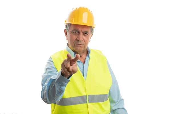 Builder pointing fingers at camera — ストック写真