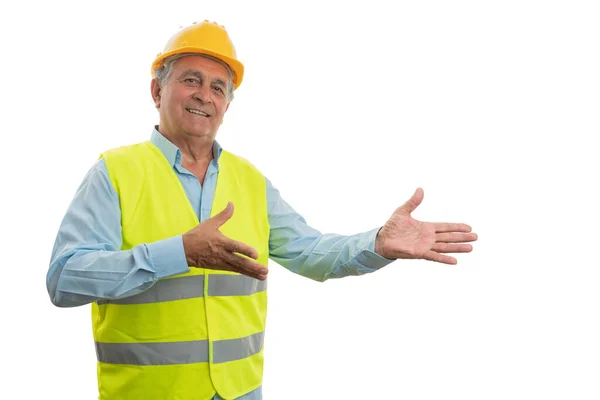 Construction worker presenting copyspace Royalty Free Stock Photos