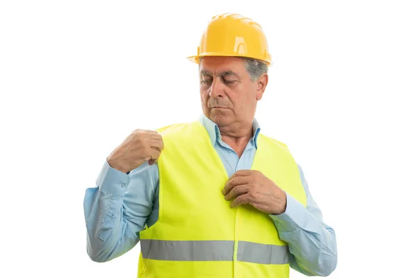 Builder arranging vest — Stock Photo, Image