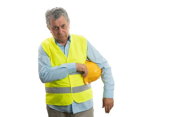 Builder holding helmet — ストック写真