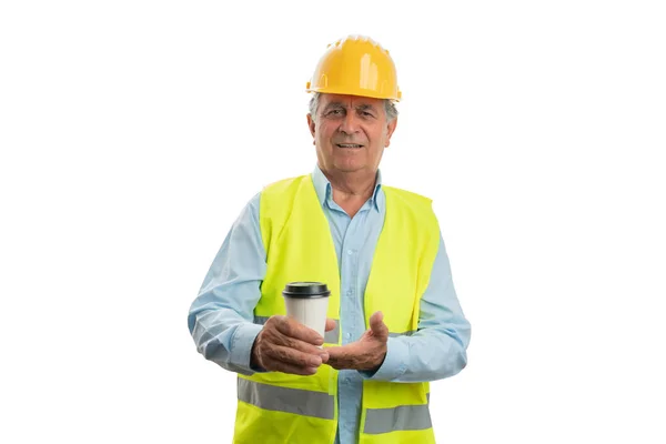 Constructeur présentant tasse à café — Photo