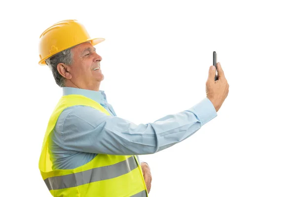 Travailleur de la construction prenant selfie — Photo