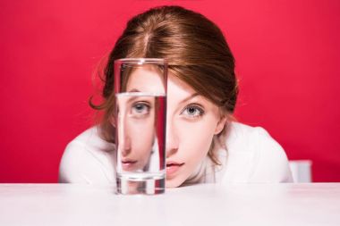 young woman with glass of water clipart